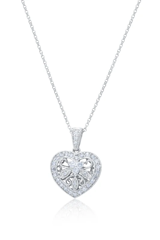 Trendy Minimalist Jewelry For Everyday Wear Classic Modern Offers 14 kt white gold diamond pendant with a filigree heart design adorned with 0.60 cts tw diamonds Trendy Minimalist Jewelry For Everyday Wear Classic Modern Offers 14 kt white gold diamond pendant with a filigree heart design adorned with 0.60 cts tw diamonds