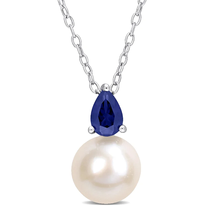Dazzle In Elegance With Our Biggest Jewelry Sale Affordable Trendy Fashion 8.5-9 MM White Freshwater Cultured Pearl and 5/8 CT TGW Created Blue Sapphire Solitaire Pendant with Chain in Sterling Silver Dazzle In Elegance With Our Biggest Jewelry Sale Affordable Trendy Fashion 8.5-9 MM White Freshwater Cultured Pearl and 5/8 CT TGW Created Blue Sapphire Solitaire Pendant with Chain in Sterling Silver