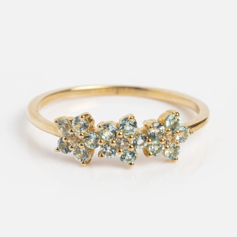 Exclusive Jewelry Bundles At Discounted Prices Fashion-Forward Solid Gold Blue Topaz Flower Trio Ring